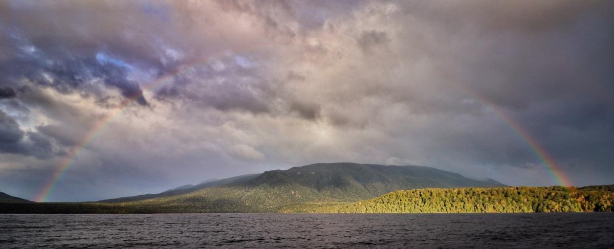 Full rainbow at Lake Te Anau on New Zealand South Island